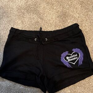 Beautiful Disaster Lounge Shorts with Purple Wing logo.